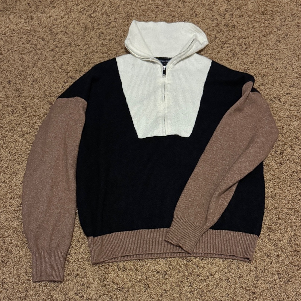 Elegant Women's Black, White, and Brown Sweater